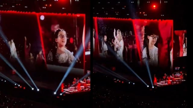 腼腆女孩收第3顶“22”幸运帽　Taylor Swift主动击掌太暖啦！
