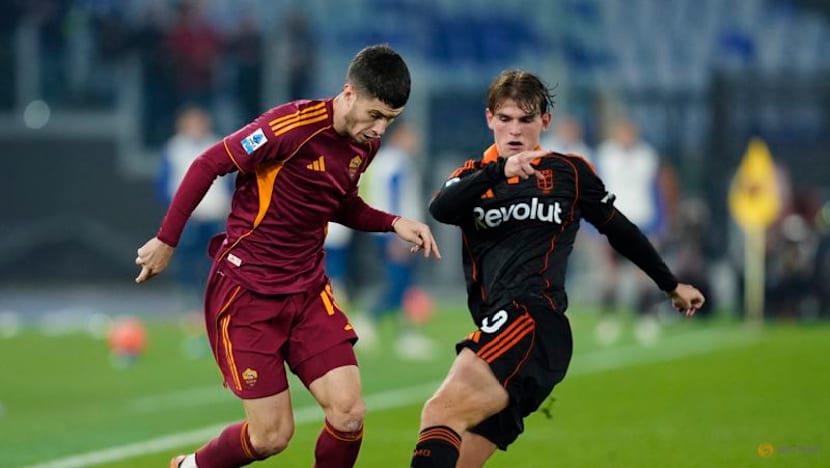 Roma remain in title hunt with 1-0 win over Como