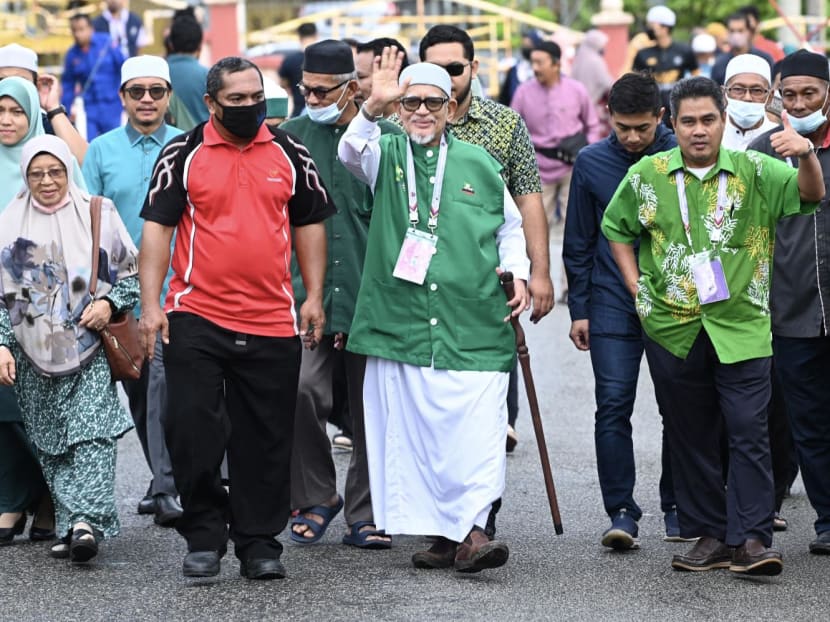 Mr Abdul Hadi Awang (centre), president of the Malaysian Islamic Party, (PAS) waves to his supporters during the general election in Marang,Terengganu on Nov 19, 2022. Mr Abdul Hadi Awang (centre), president of the Malaysian Islamic Party, (PAS) waves to his supporters during the general election in Marang,Terengganu on Nov 19, 2022.