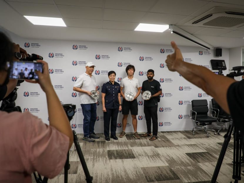 Assistant Commissioner of Police Serene Chiu (second from left), the Commander of Clementi Division, with Mr Mok Kwong Heng (left), Mr Emmanuel Ee Wei Chuan (second from right) and Mr Gangatharan Saravanan (right). Assistant Commissioner of Police Serene Chiu (second from left), the Commander of Clementi Division, with Mr Mok Kwong Heng (left), Mr Emmanuel Ee Wei Chuan (second from right) and Mr Gangatharan Saravanan (right).