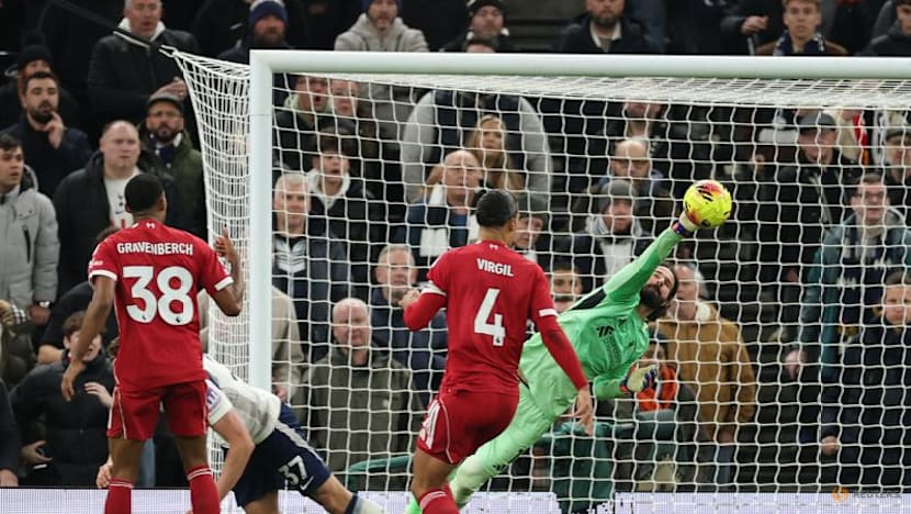 Isak on target but injured as Liverpool hang on to defeat Tottenham