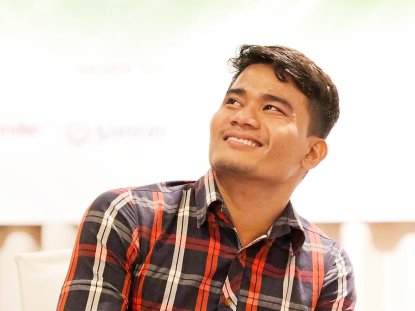 Cambodian trafficking survivor Chhap Longdy speaks to stakeholders at the Hagar Charity golf dinner on July 24. Photo: Kelda Chua