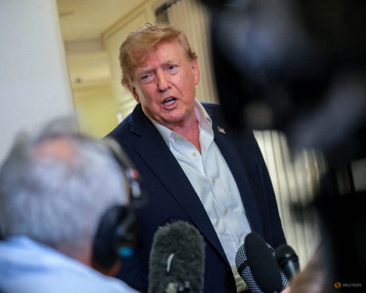 Trump blasts 'sick conspiracy' against AI as warnings mount