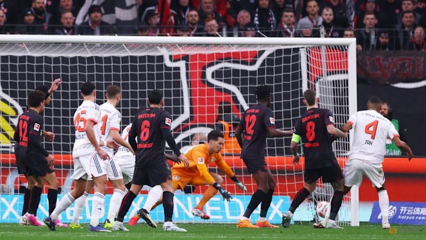 Nine-man Bayern come from behind to rescue 1-1 draw at Leverkusen