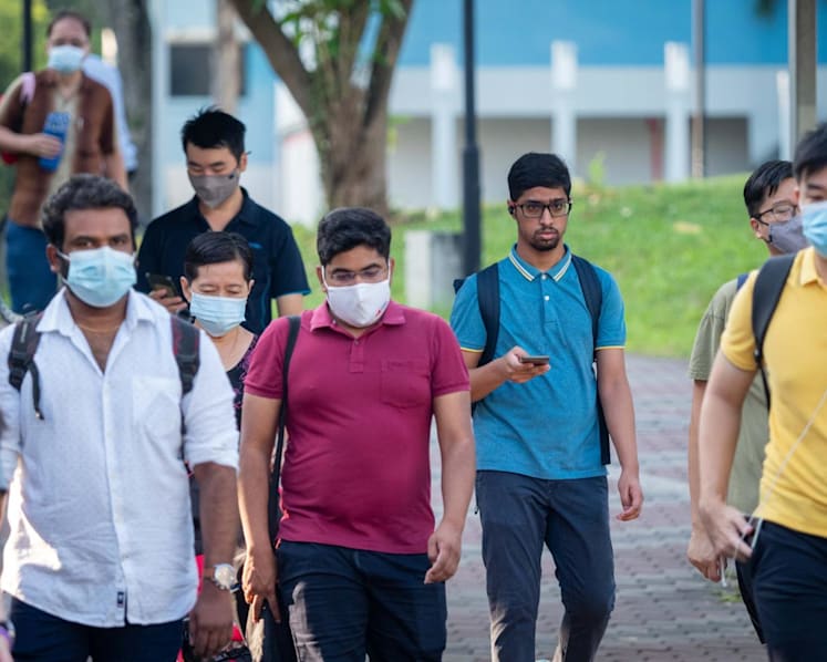 On first day of relaxed rules, most Singaporeans still prefer to stay masked outdoors but have larger gatherings planned