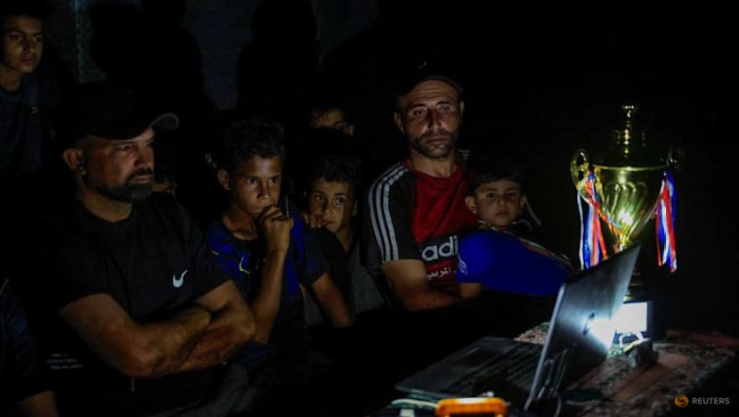 Gazans displaced by war watch World Cup from the ruins