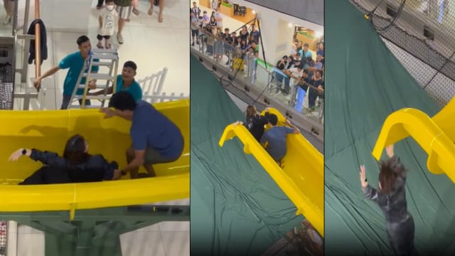 体验新山商场空中滑梯 女子中途卡住