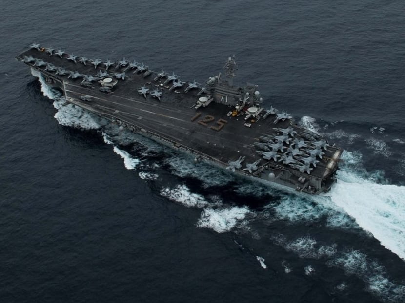 The USS Theodore Roosevelt passing through the Straits of Malacca on April 1.