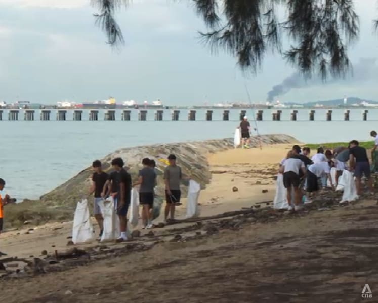 Growing numbers of volunteers tackle trash on Singapore's beaches