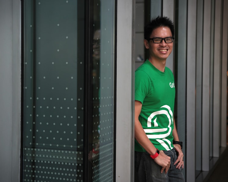 Grab top exec plays down concerns over Uber deal, pledges not to raise charges