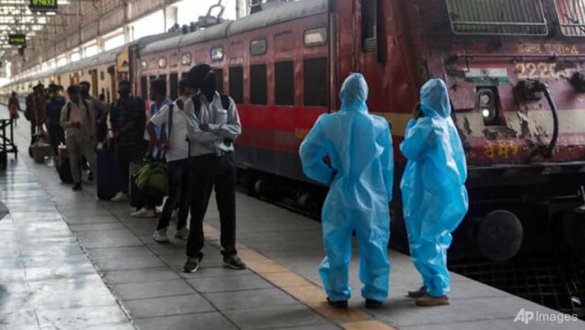 Day workers fill trains out of Mumbai as COVID-19 dries up jobs