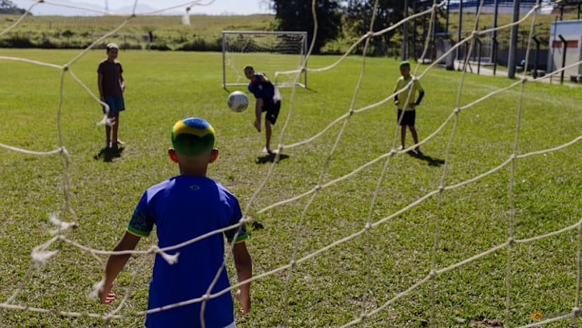 Barber shaves World Cup dreams into Brazilian fans' hair