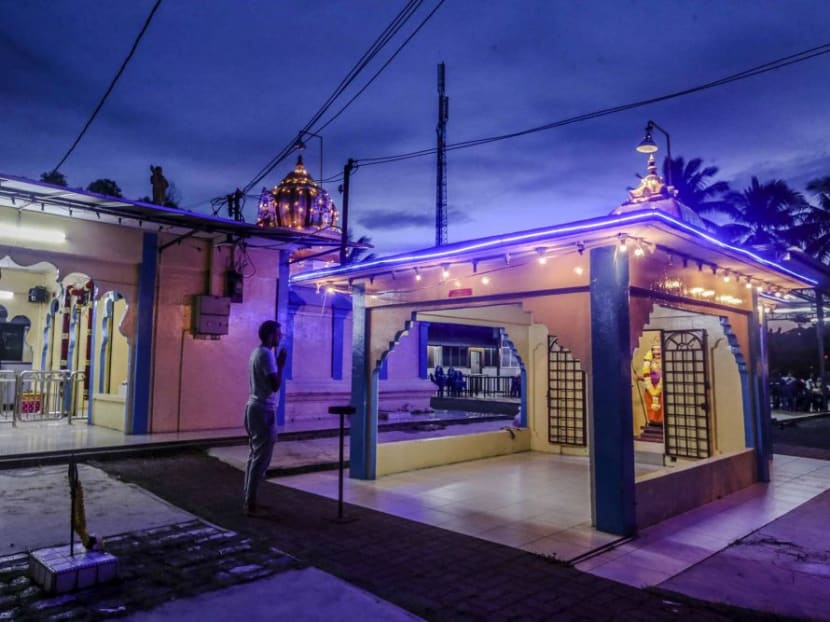 Hindu devotee prays at the Sri Maha Mariamman Devasthanam temple on November 27, 2018.