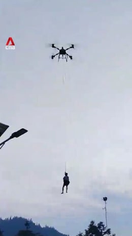 Drones rescue stranded victims in flood-hit China