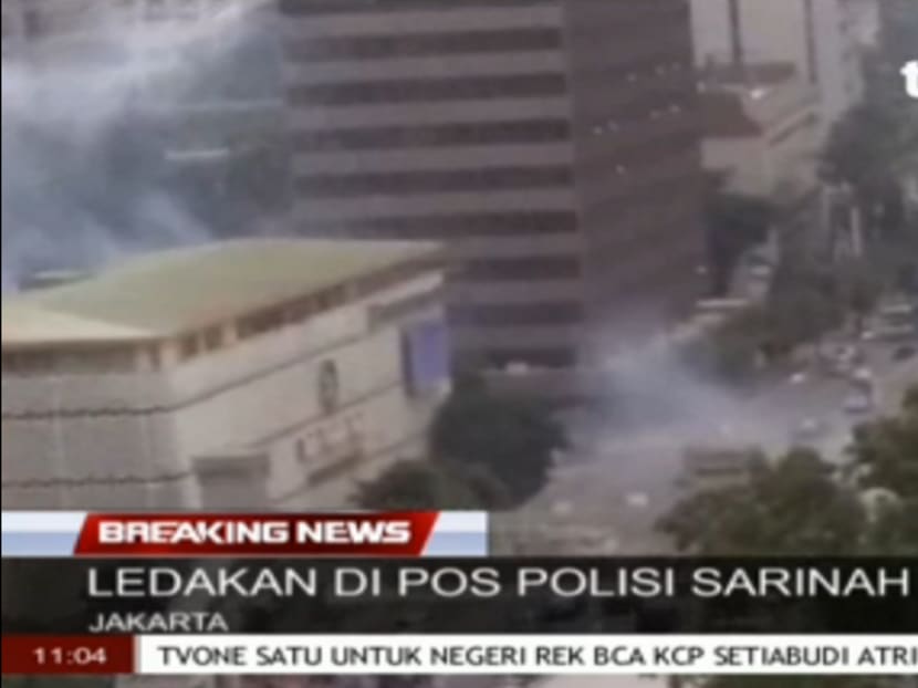 Seven dead in Jakarta blasts, gunfight