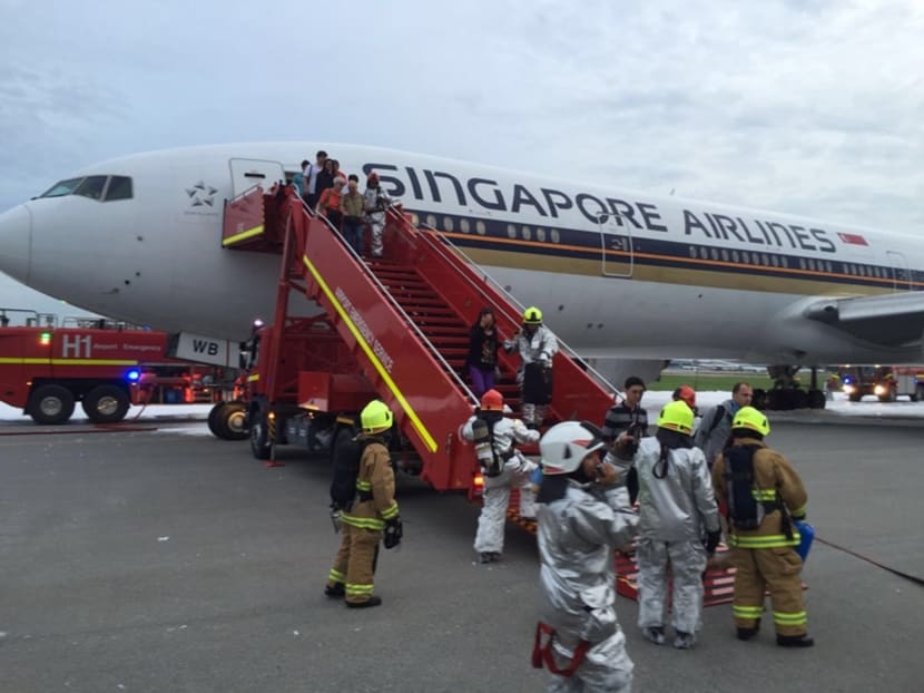 SIA jet makes emergency return to Changi, bursts into flames on runway
