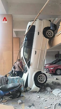 Car crashes through condo wall in Malaysia 