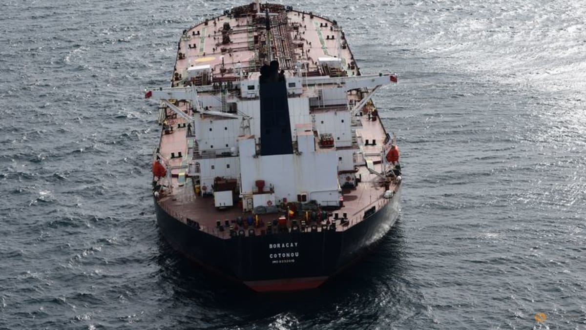 Oil up as investors balance sanctions risks, oversupply worries