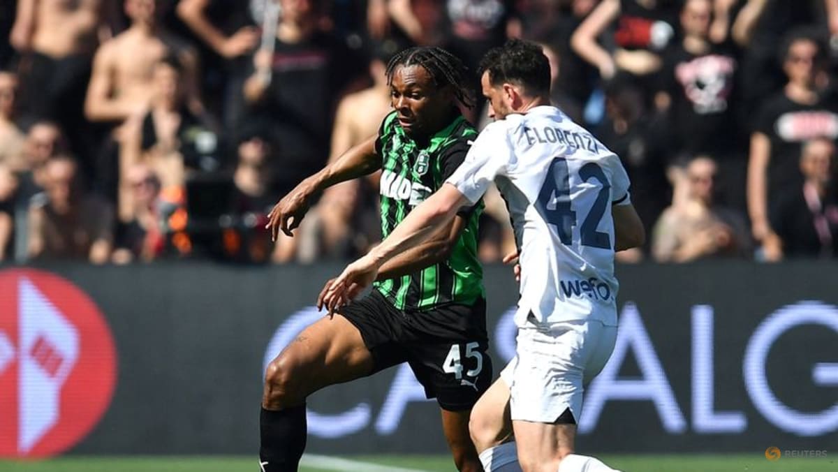 Milan held to 2-2 home draw by Sassuolo after late Lauriente equaliser