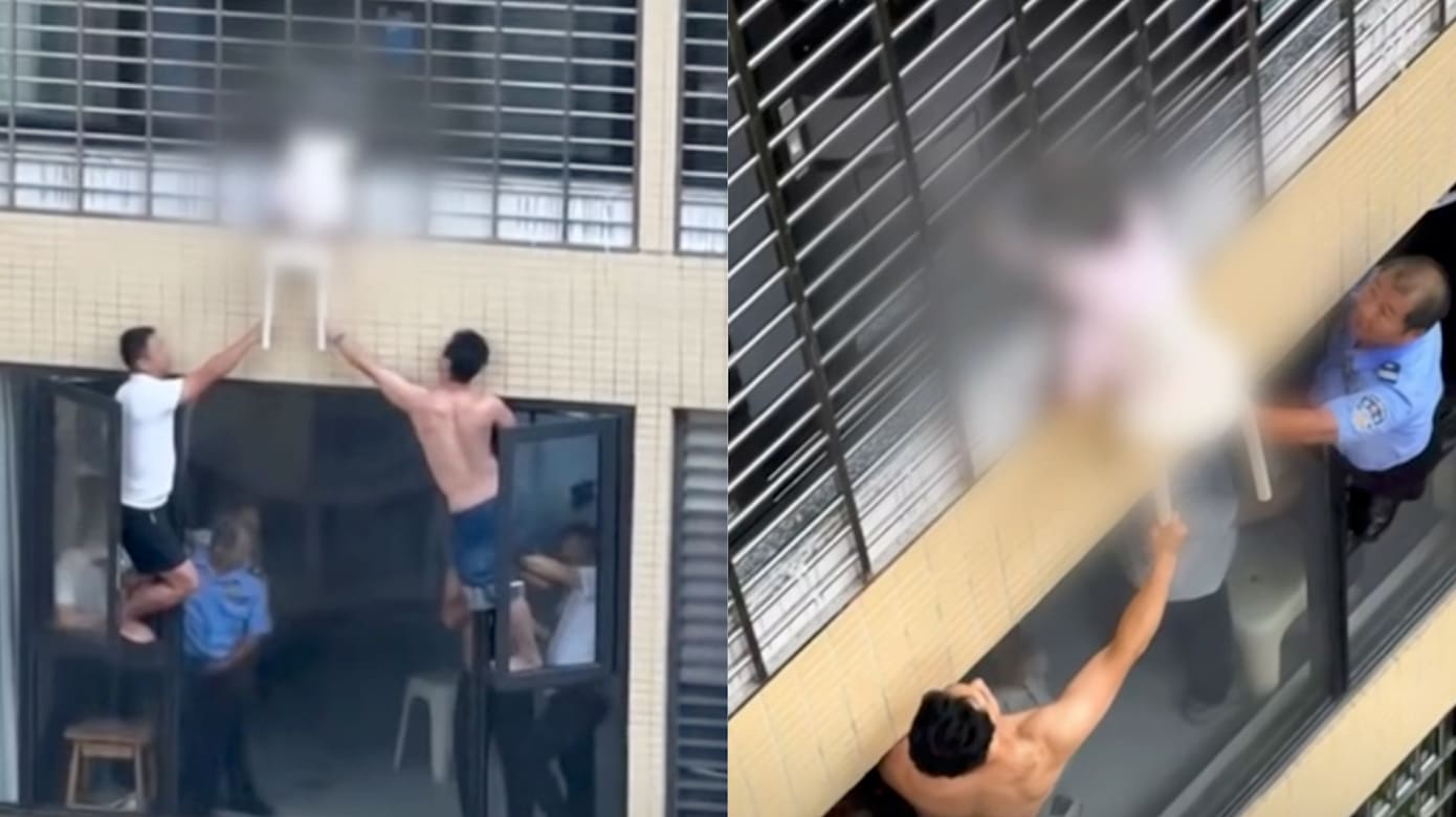 惊险！三岁女童头卡防护网 悬空12楼外