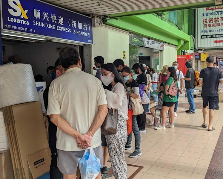 Worried China nationals in Singapore queue to send Panadol to relatives back home
