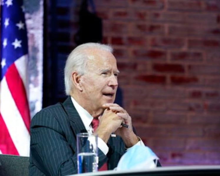 Biden chides Trump for lack of cooperation on COVID-19 vaccine