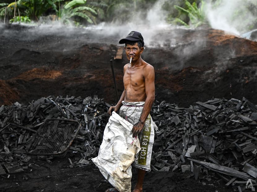 Malaysia's charcoal workers who risk life and health to do the work shunned by most Malaysia's charcoal workers who risk life and health to do the work shunned by most