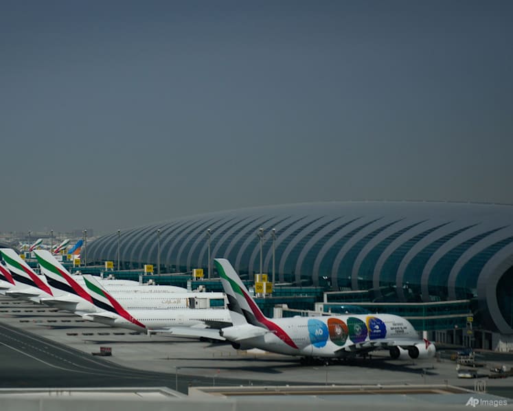 Dubai airport flights disrupted after nearby drone fire, one killed in Abu Dhabi