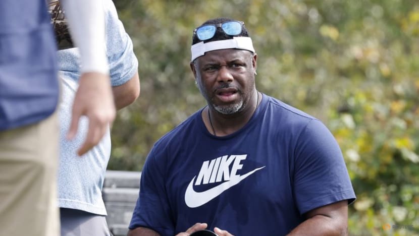 Baseball Hall of Famer Griffey Jr. working as photographer at Masters