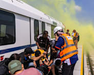 Singapore, Malaysia test emergency response to simulated fire on stranded RTS Link train