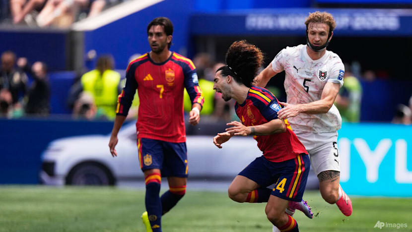 Spain ease past Austria with 3-0 World Cup win Spain ease past Austria with 3-0 World Cup win