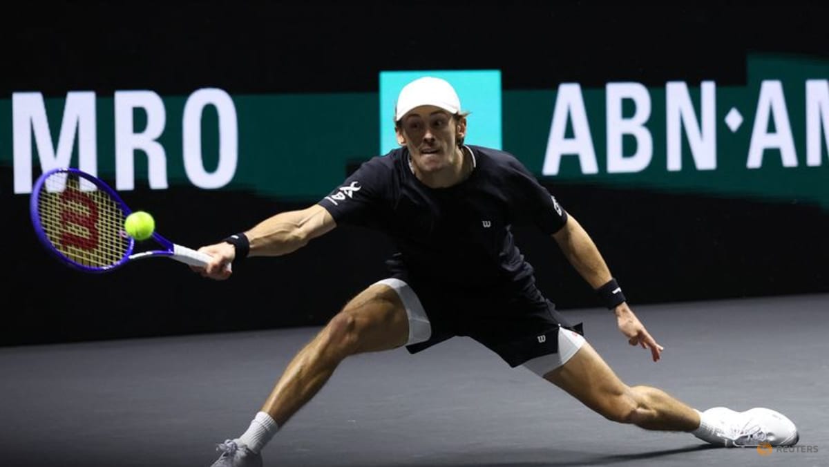 Third time lucky De Minaur dominates Auger-Aliassime to win Rotterdam Open