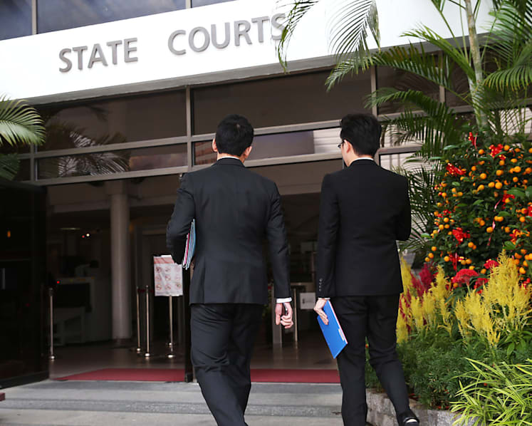 Trial begins for couple accused of selling talismans in S$490,000 scam