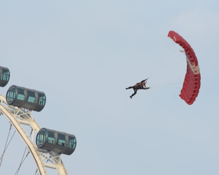 Sudden change in wind conditions contributed to Red Lions parachutist's hard landing at NDP: Ng Eng Hen