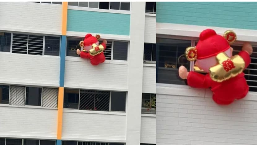 Town Council Asks Resident To Remove Inflatable God Of Fortune Hanging Outside Choa Chu Kang HDB Flat
