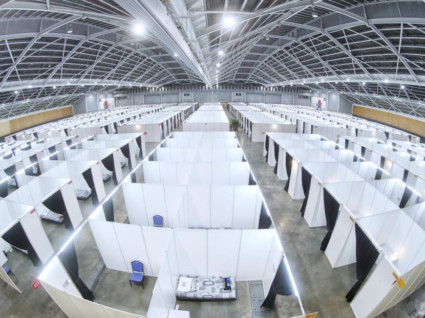 A view of a hall at the Singapore Expo Convention Hall and Exhibition Centre in Changi that is being used to house Covid-19 patients. A view of a hall at the Singapore Expo Convention Hall and Exhibition Centre in Changi that is being used to house Covid-19 patients.
