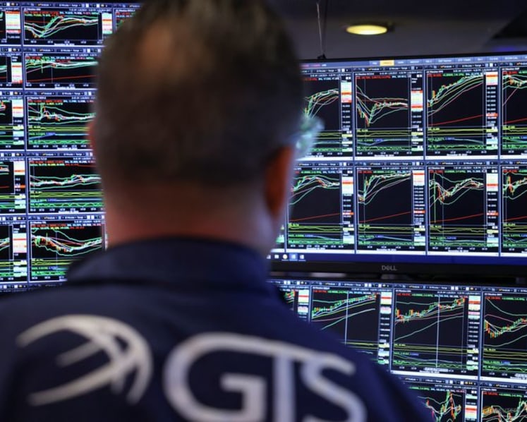 Stocks rise, yields and dollar fall after Fed cuts interest rates 