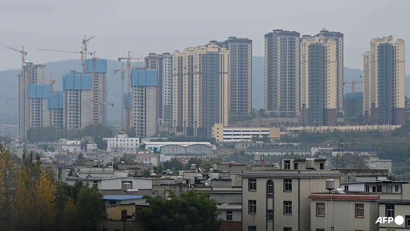 Train hits China railway workers, killing 11