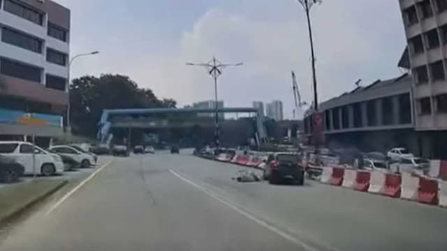 马国新山路上扑向车子 男子证实来自新加坡