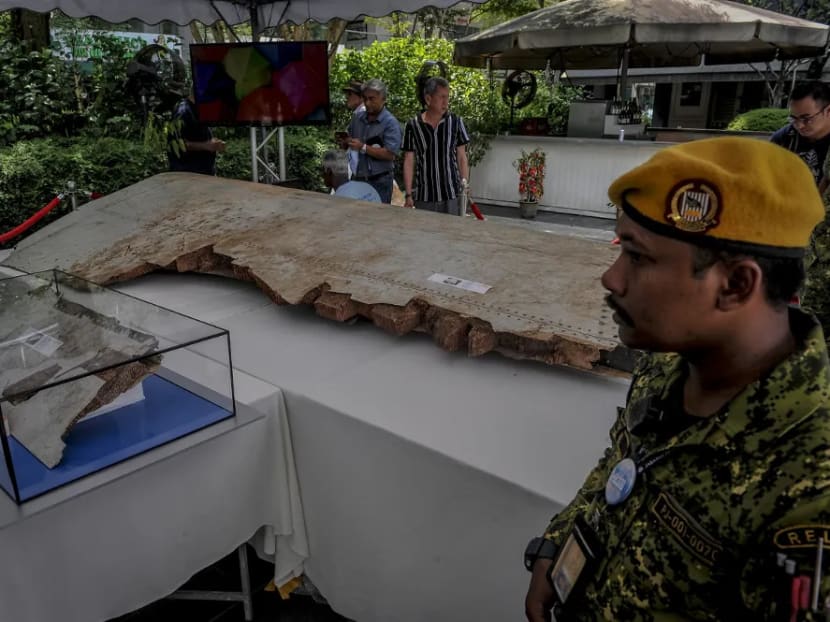 A piece of debris from flight MH370 is displayed during the remembrance ceremony to mark the 5th anniversary of the plane’s disappearance in Kuala Lumpur, March 3, 2019.