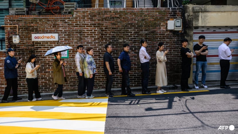 South Koreans vote early in record numbers in poll triggered by martial law South Koreans vote early in record numbers in poll triggered by martial law