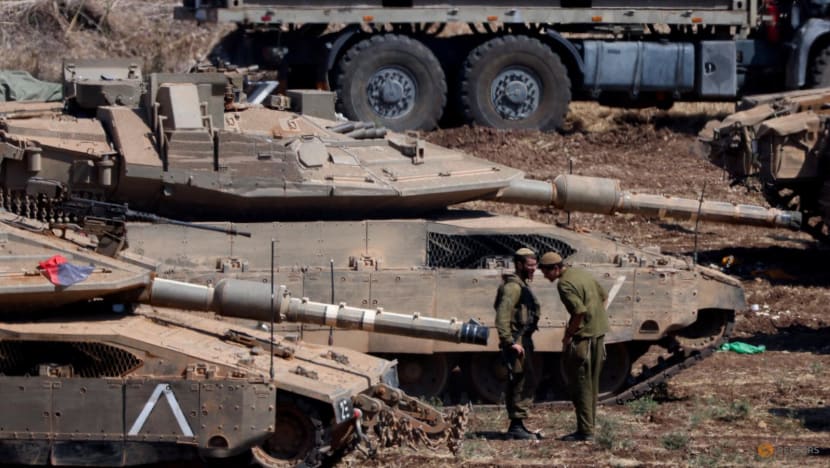 Israel beefs up forces on Lebanon border as Hezbollah reports clashes with troops Israel beefs up forces on Lebanon border as Hezbollah reports clashes with troops