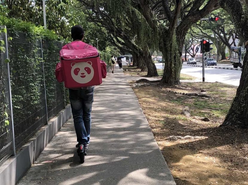 Almost 2,500 electric scooter riders with food delivery firms including Foodpanda (pictured) have applied for the e-scooter trade-in grant, the Land Transport Authority said on Friday (Nov 22).