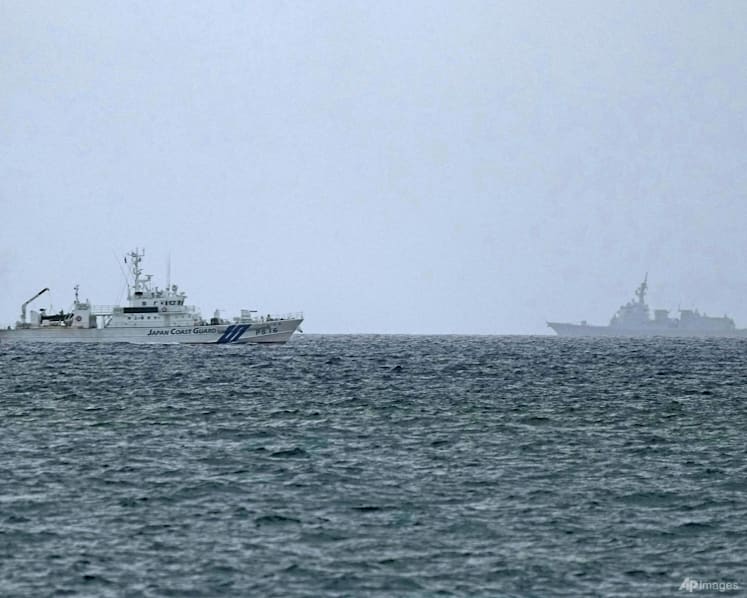 Debris found in search for missing Japanese army helicopter with 10 crew on board 