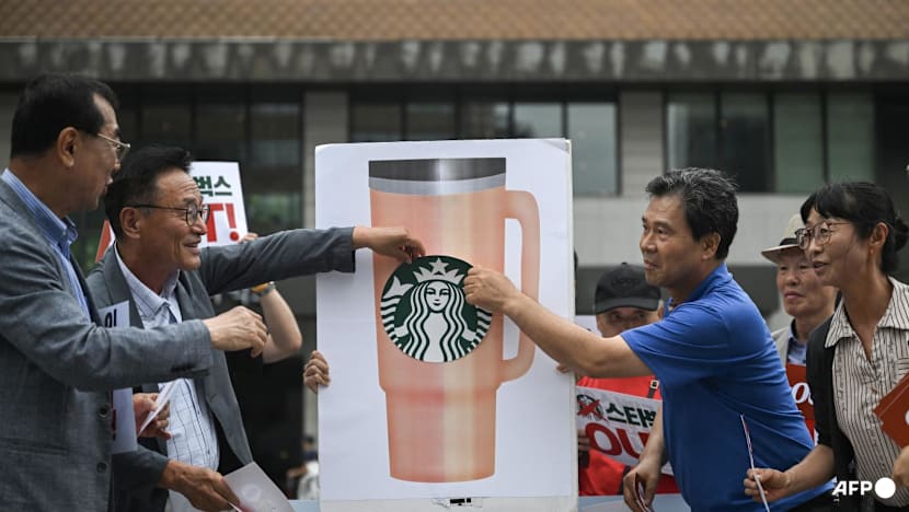 South Korean police quiz executive in Starbucks 'Tank Day' fiasco South Korean police quiz executive in Starbucks 'Tank Day' fiasco