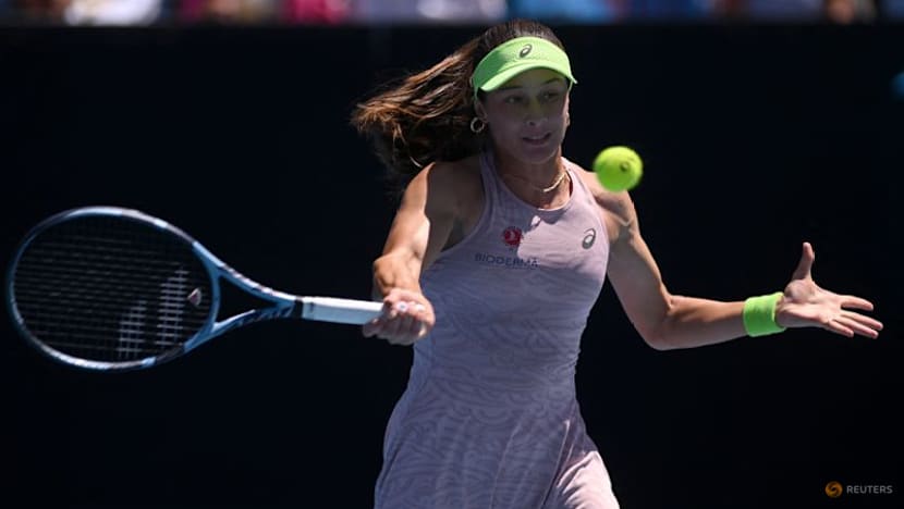 Sonmez trips over advertisement sign, tumbles out of French Open