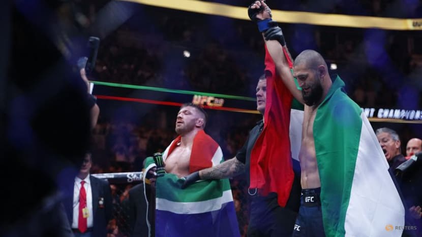 Relentless Chimaev beats du Plessis to win UFC middleweight title