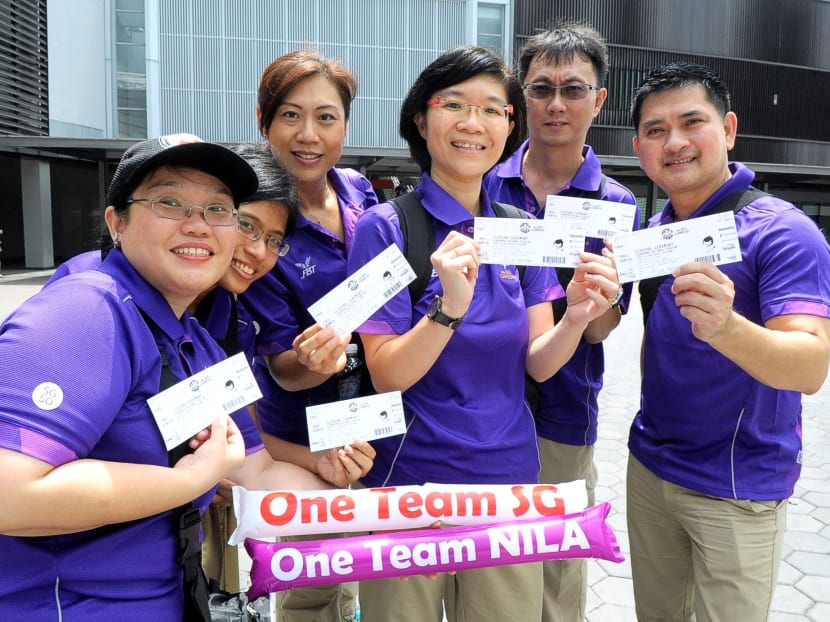 SEA Games volunteers break S'pore record for 'Largest Human Formation of a Numerical'