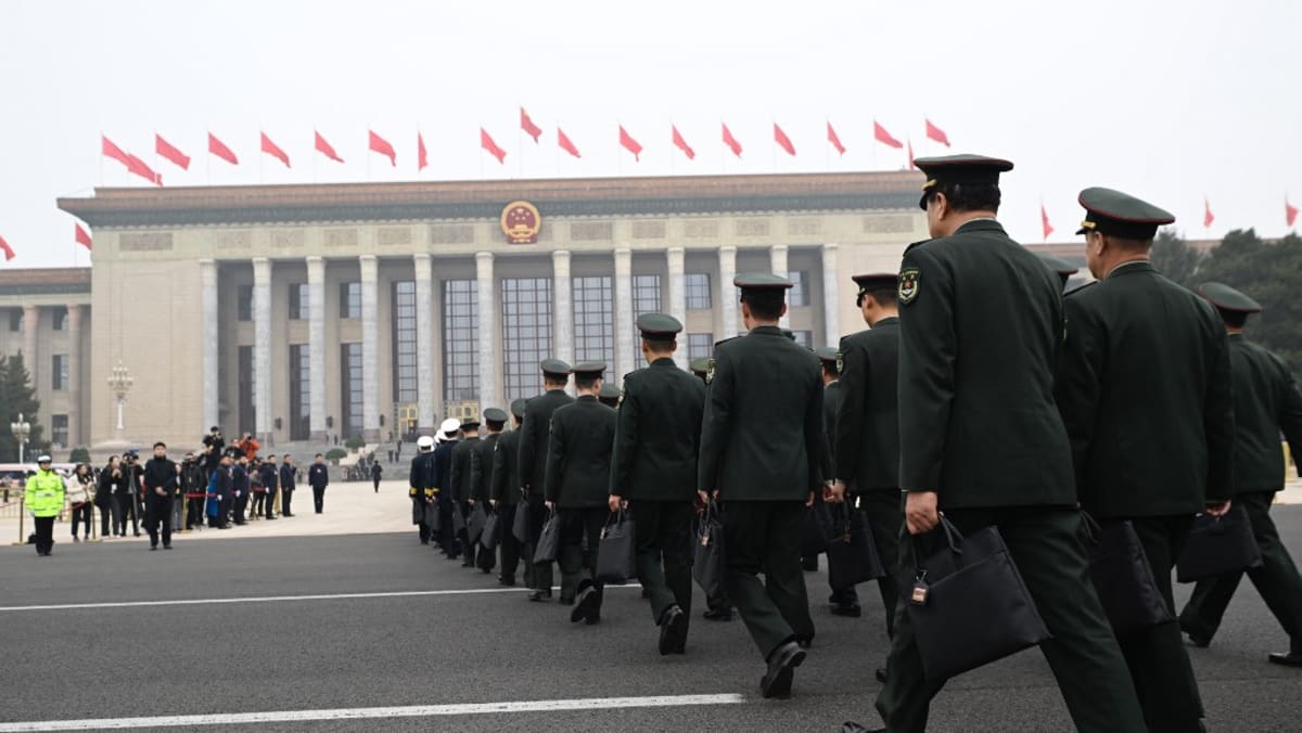 China removes five generals from national lawmaking body