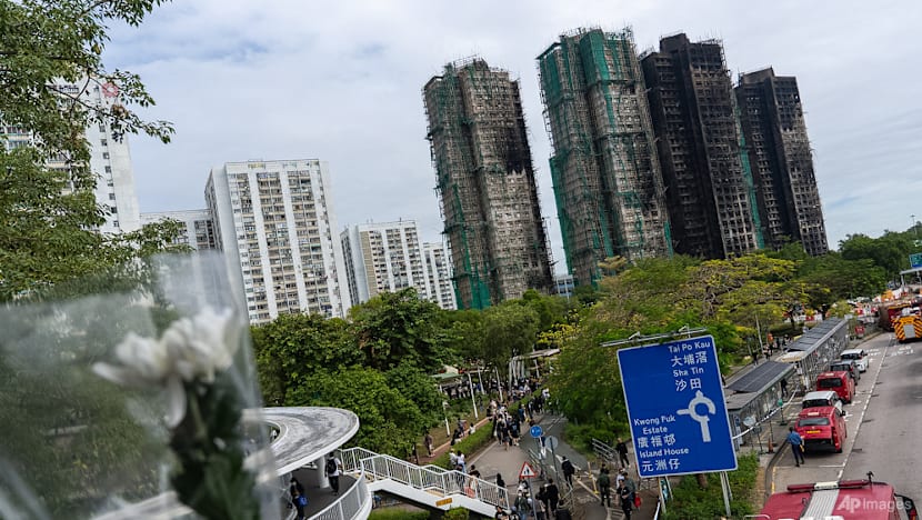 Hong Kong authorities say netting on buildings that caught fire did not meet code